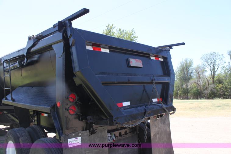 image for item B7389 2000 Travis barrel end dump trailer