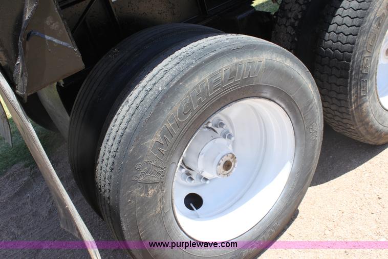 image for item B7389 2000 Travis barrel end dump trailer