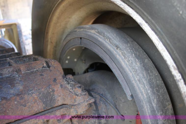 image for item B7389 2000 Travis barrel end dump trailer