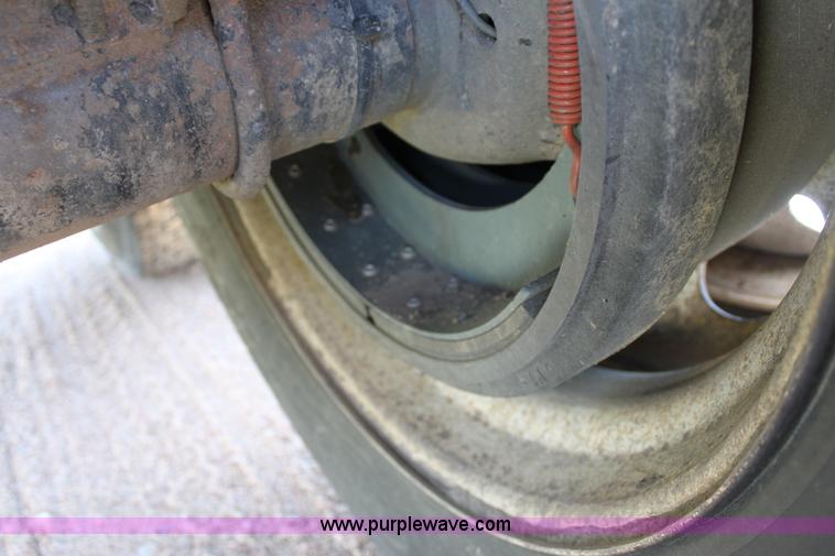 image for item B7389 2000 Travis barrel end dump trailer