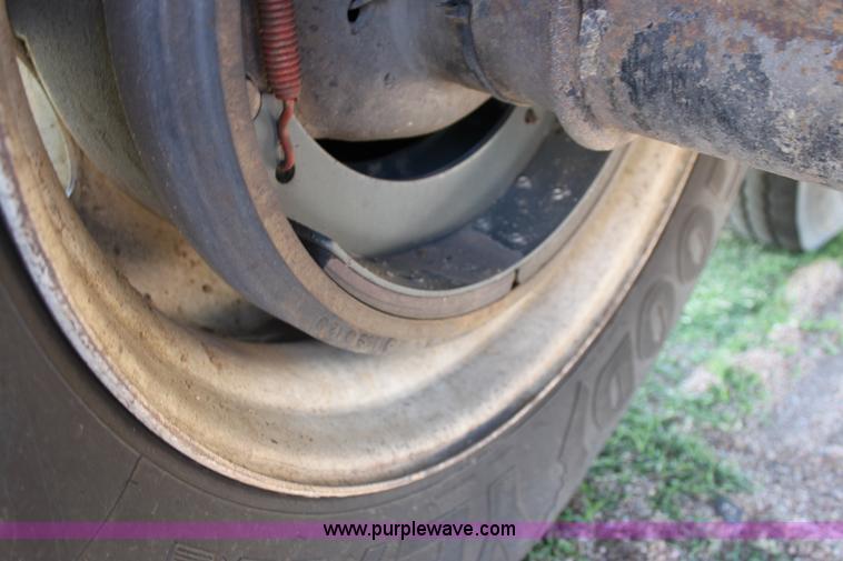 image for item B7389 2000 Travis barrel end dump trailer