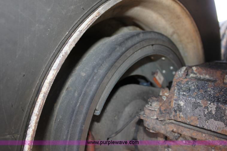 image for item B7389 2000 Travis barrel end dump trailer