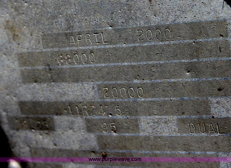 image for item B7389 2000 Travis barrel end dump trailer