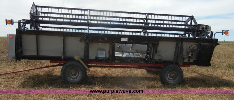 image for item D4389 AGCO 800 Series flex platform with trailer
