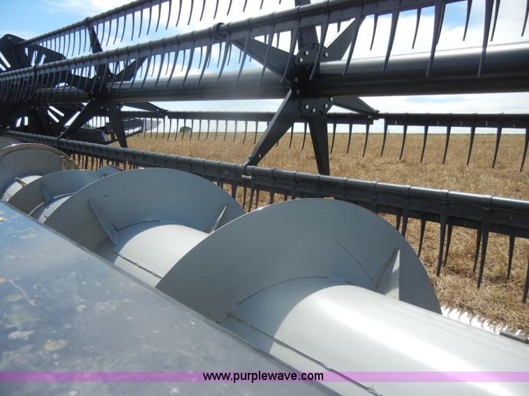 image for item D4389 AGCO 800 Series flex platform with trailer