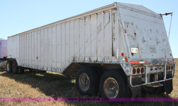 image for item D4499 1974 Cornhusker double hopper grain trailer