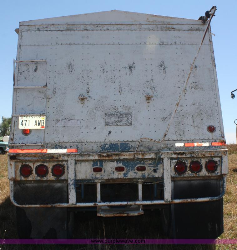image for item D4499 1974 Cornhusker double hopper grain trailer