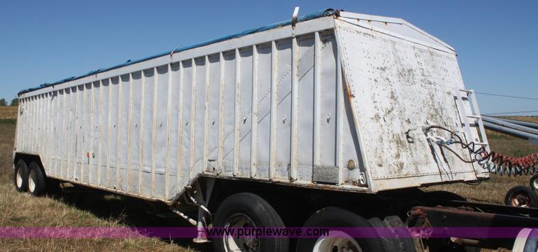 image for item D4499 1974 Cornhusker double hopper grain trailer
