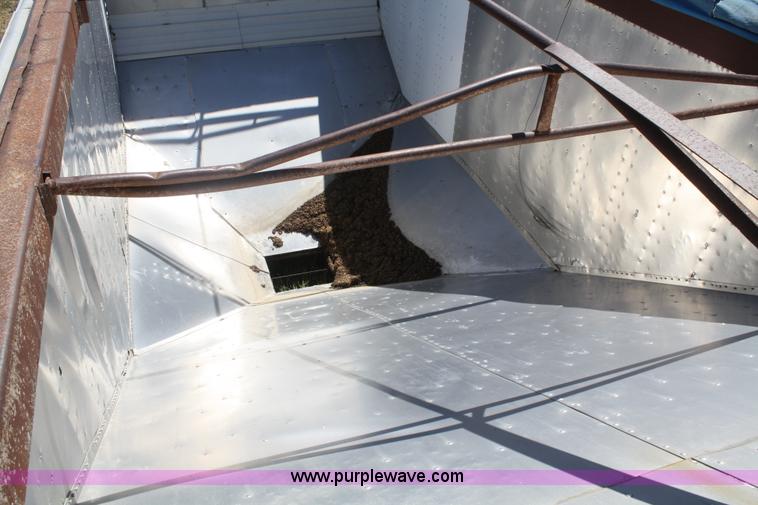 image for item D4499 1974 Cornhusker double hopper grain trailer