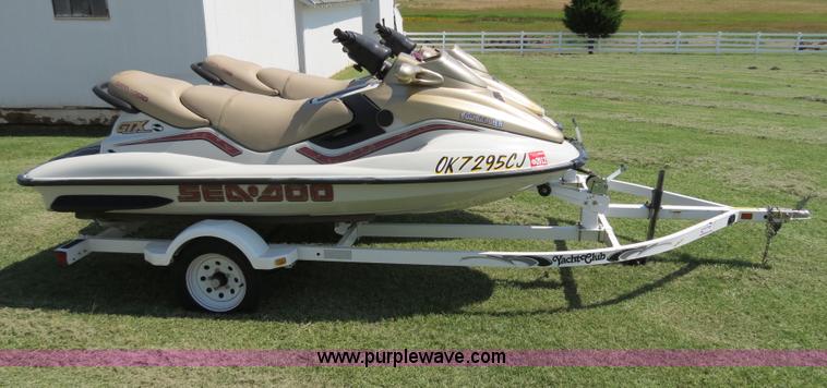 image for item B2391 (2) 1999 Bombardier GTX RFI Sea-Doo jet skis with trailer