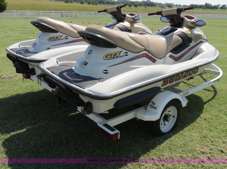 image for item B2391 (2) 1999 Bombardier GTX RFI Sea-Doo jet skis with trailer