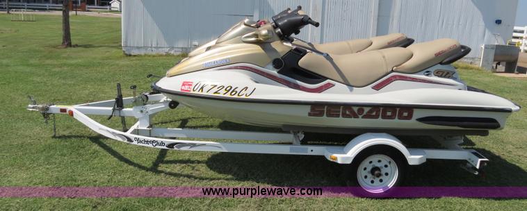 image for item B2391 (2) 1999 Bombardier GTX RFI Sea-Doo jet skis with trailer