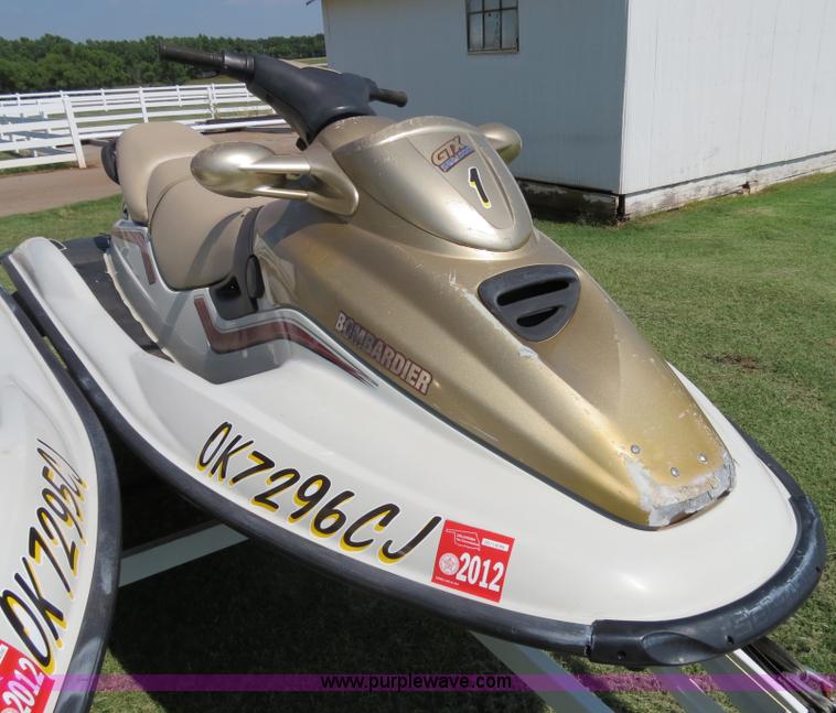 (2) 1999 Bombardier GTX RFI SeaDoo jet skis with trailer in Edmond, OK