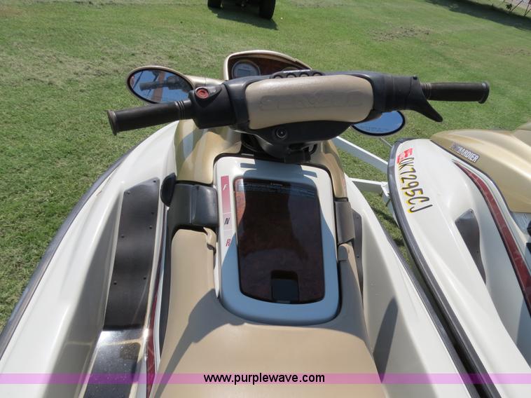 image for item B2391 (2) 1999 Bombardier GTX RFI Sea-Doo jet skis with trailer