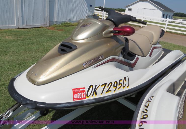 image for item B2391 (2) 1999 Bombardier GTX RFI Sea-Doo jet skis with trailer