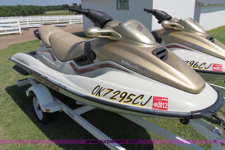 image for item B2391 (2) 1999 Bombardier GTX RFI Sea-Doo jet skis with trailer