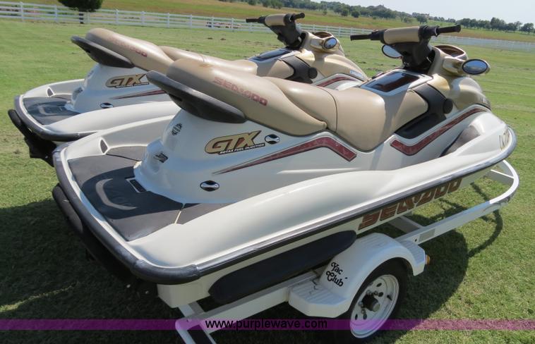 image for item B2391 (2) 1999 Bombardier GTX RFI Sea-Doo jet skis with trailer