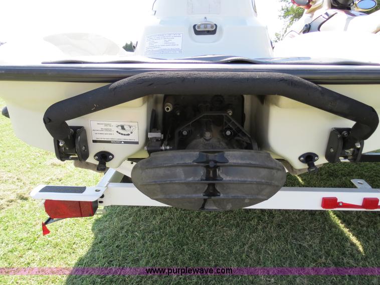 image for item B2391 (2) 1999 Bombardier GTX RFI Sea-Doo jet skis with trailer