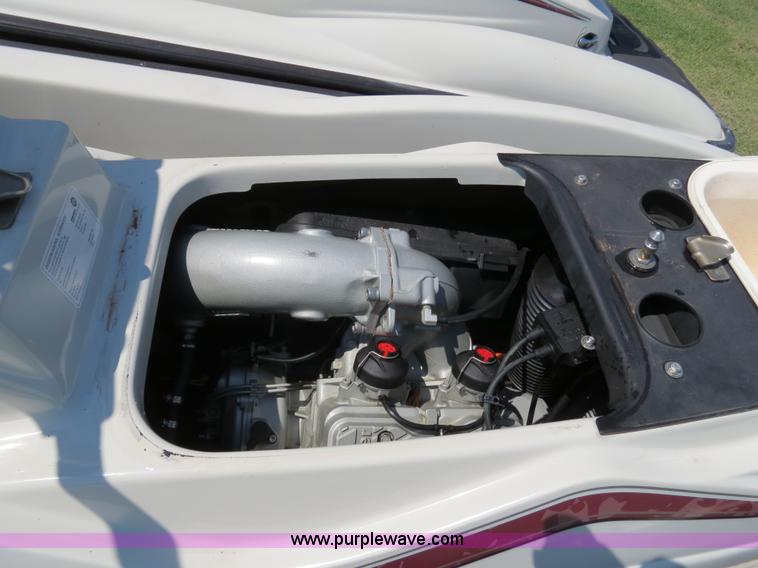 image for item B2391 (2) 1999 Bombardier GTX RFI Sea-Doo jet skis with trailer