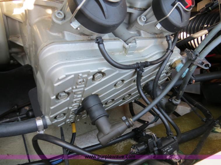 image for item B2391 (2) 1999 Bombardier GTX RFI Sea-Doo jet skis with trailer