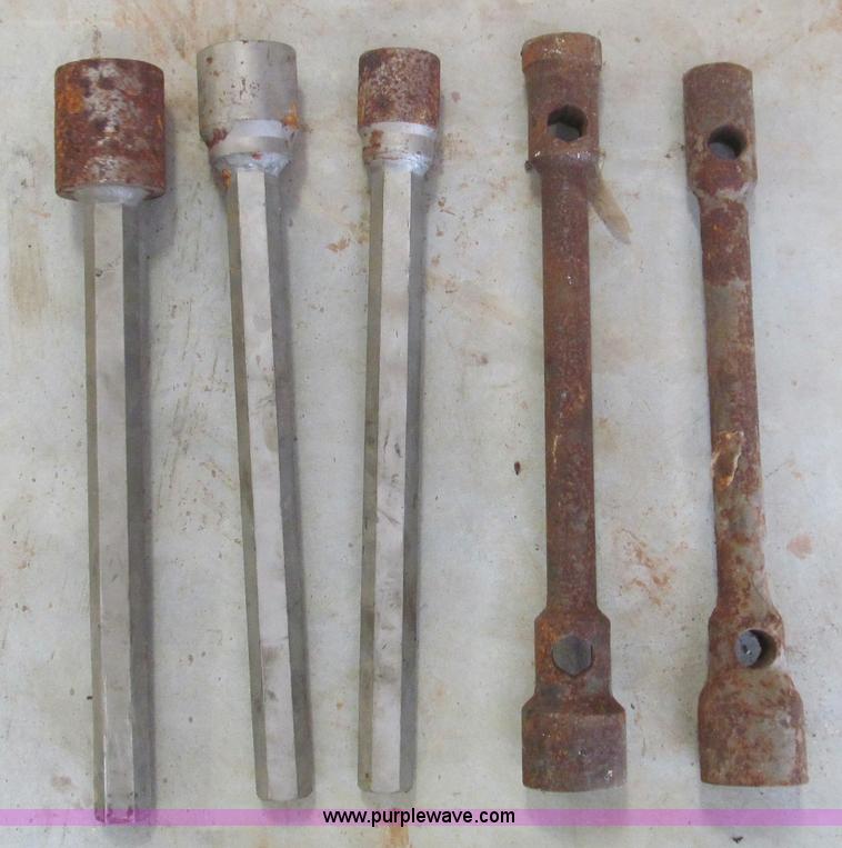 image for item F4523 Assorted large wrenches, sockets, Allen wrenches, and threading equipment