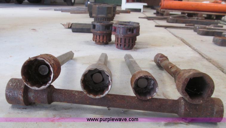 image for item F4523 Assorted large wrenches, sockets, Allen wrenches, and threading equipment