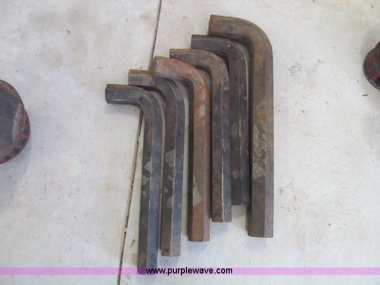 image for item F4523 Assorted large wrenches, sockets, Allen wrenches, and threading equipment
