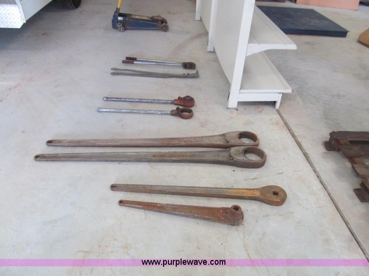 image for item F4523 Assorted large wrenches, sockets, Allen wrenches, and threading equipment