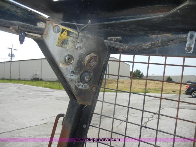 image for item M9710 Ford CL25 skid steer