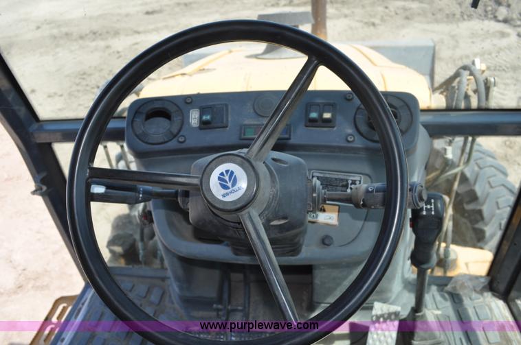 image for item A5959 New Holland 555E backhoe