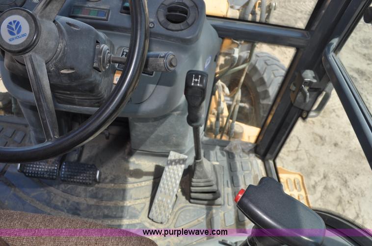 image for item A5959 New Holland 555E backhoe