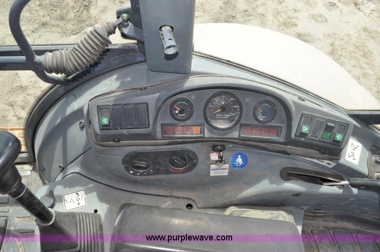 image for item A5959 New Holland 555E backhoe