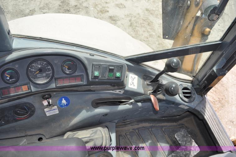 image for item A5959 New Holland 555E backhoe