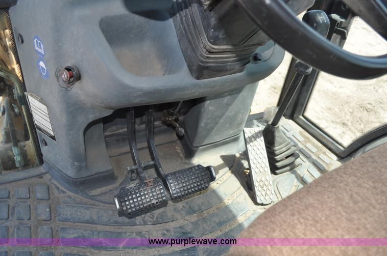 image for item A5959 New Holland 555E backhoe