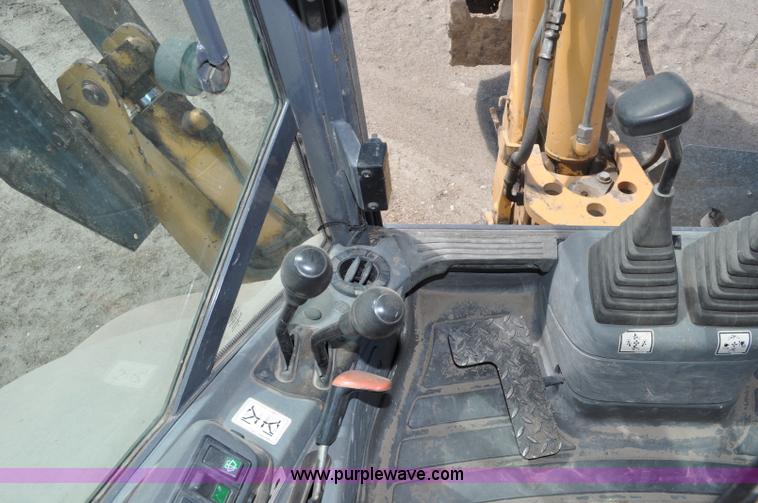 image for item A5959 New Holland 555E backhoe