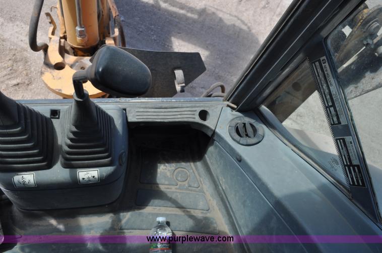 image for item A5959 New Holland 555E backhoe