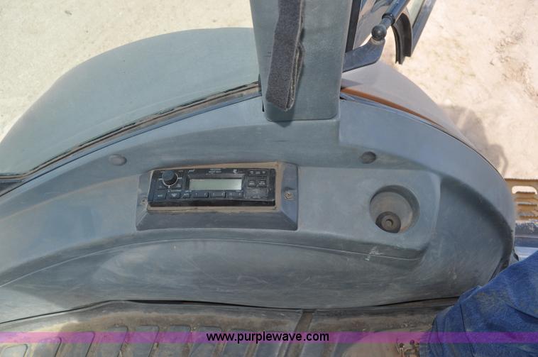 image for item A5959 New Holland 555E backhoe