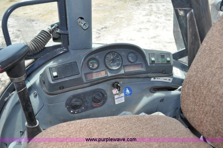 image for item A5959 New Holland 555E backhoe