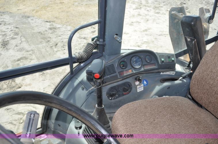 image for item A5959 New Holland 555E backhoe