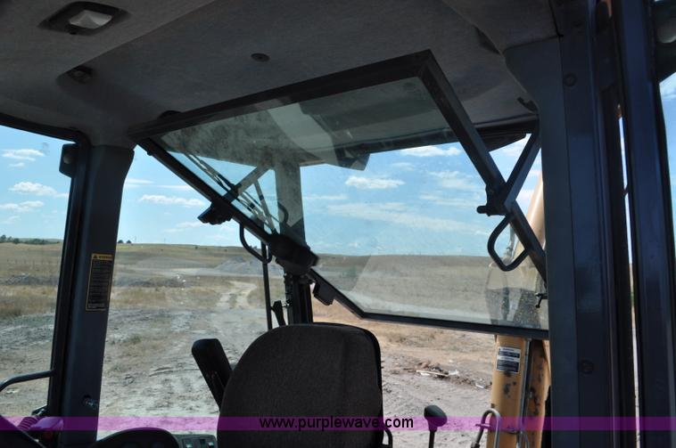 image for item A5959 New Holland 555E backhoe