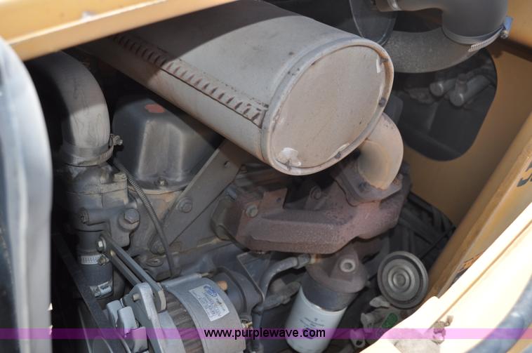 image for item A5959 New Holland 555E backhoe