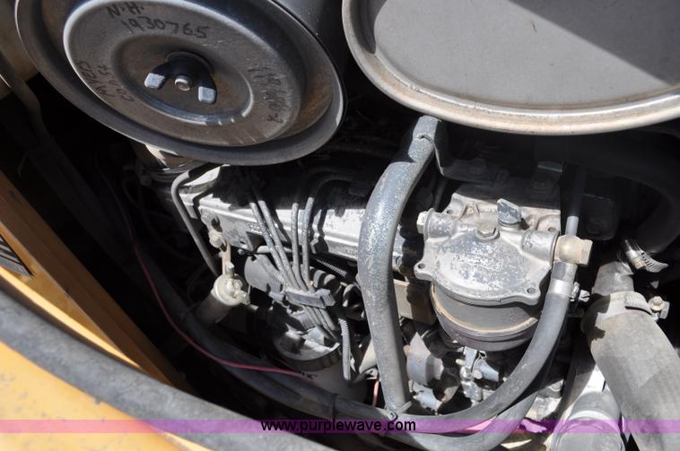 image for item A5959 New Holland 555E backhoe