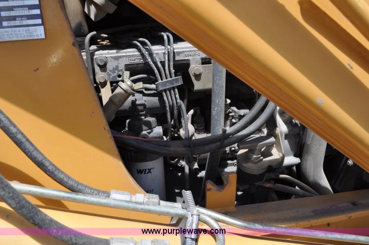 image for item A5959 New Holland 555E backhoe