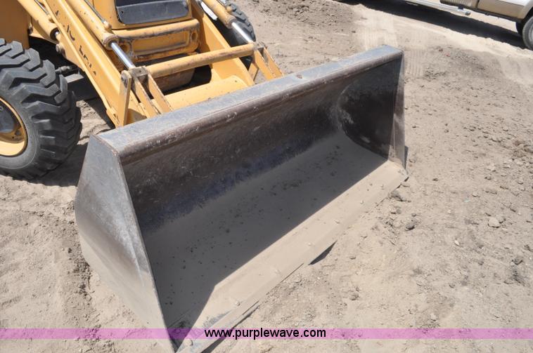 image for item A5959 New Holland 555E backhoe