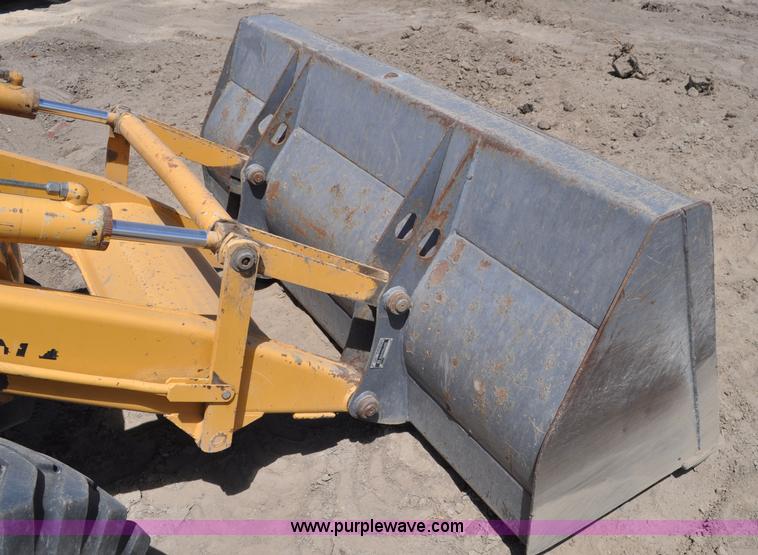 image for item A5959 New Holland 555E backhoe