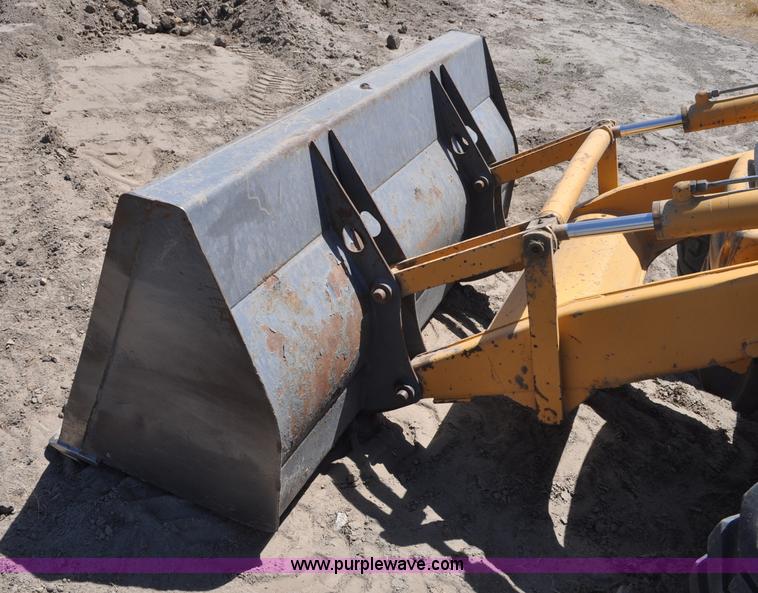 image for item A5959 New Holland 555E backhoe