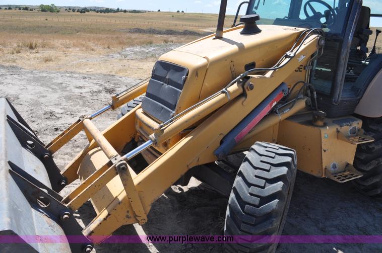 image for item A5959 New Holland 555E backhoe