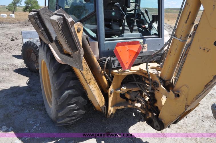 image for item A5959 New Holland 555E backhoe