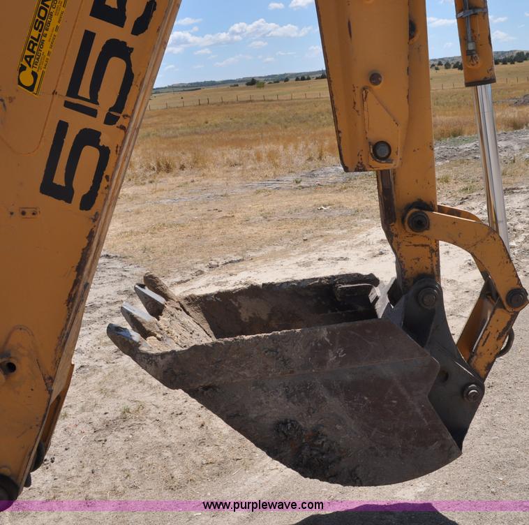 image for item A5959 New Holland 555E backhoe