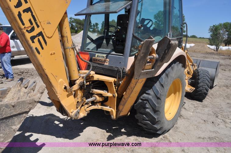 image for item A5959 New Holland 555E backhoe